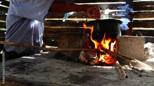 hole in the fire of a wood stove made of artisanal cement, used in Latin American towns to prepare food in the traditional way