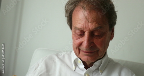 Wallpaper Mural Older man using cellphone device Torontodigital.ca