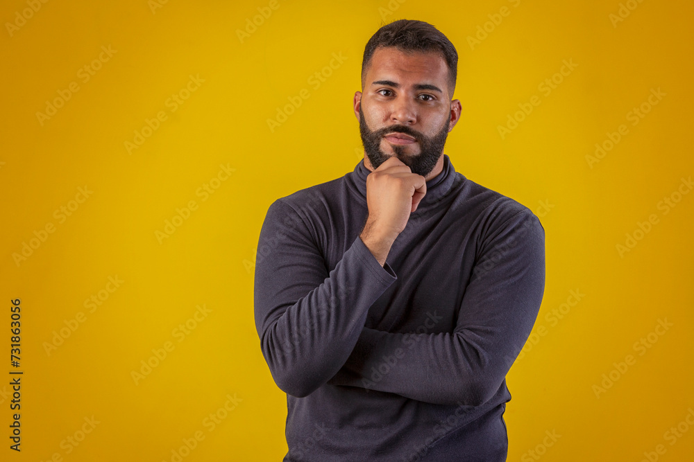 Man with beard wearing black shirt, with various facial expressions Man with beard wearing black shirt, with various facial expressions