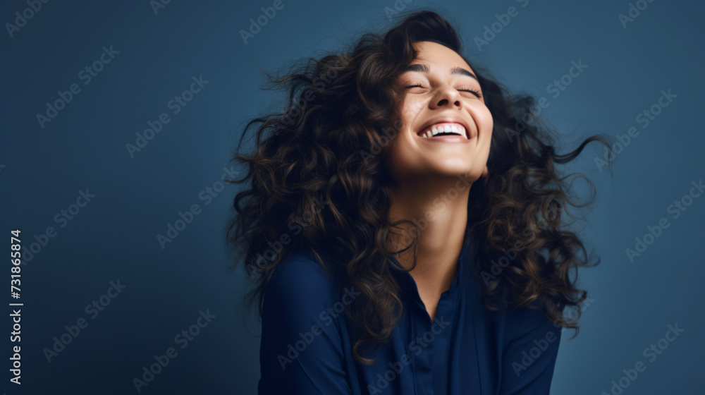 Portrait of an excited young woman celebrating success Portrait of an excited young woman celebrating success