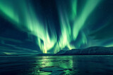 Beautiful green aurora borealis over the mountains with snow at night
