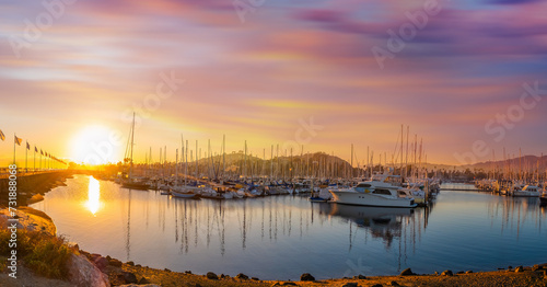 Sunset over Marina with docked boats with Santa Barbara Mountains on the background © CK