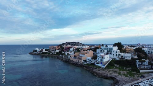 Wallpaper Mural Aerial of buildings on the shore surrounded by the blue sea in Greece under the cloudy sky Torontodigital.ca