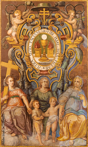 VALENCIA, SPAIN - FEBRUARY 15, 2022: The fresco of blazon with eucharist symbolic and saints in the church Iglesia del Patriarca by unknown artist. 