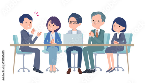 真剣に会議する会社員たち