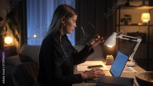 Tired Young Woman Freelancer Feeling Annoyed During Study or Work at Home Workplace at late Night