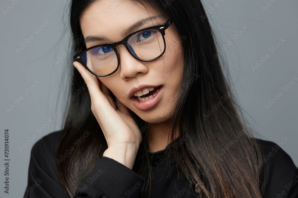 Glasses woman beautiful pointing asian finger background portrait Glasses woman beautiful pointing asian finger background portrait