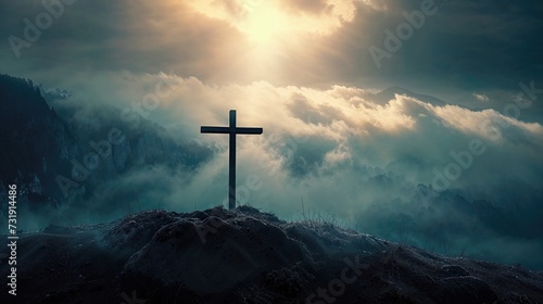 Crucifix in a Dramatic Mountainous Environment. Atmospheric Christian Concept. photo