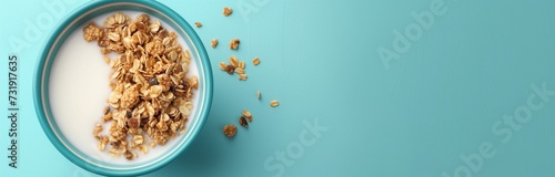 bowl of cereal milk  with banana photo