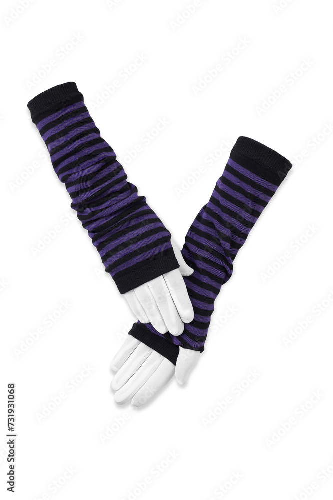 Close-up photo of a pair of striped fingerless gloves with thumbhole. Long black and purple glovelettes are isolated on a white background. Front view. Close-up photo of a pair of striped fingerless gloves with thumbhole. Long black and purple glovelettes are isolated on a white background. Front view.