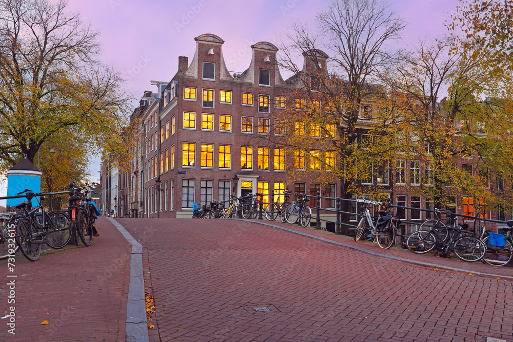 Amsterdam houses at twilight in the Netherlands at sunset