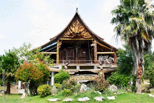 Ordination hall or antique ubosot for thai traveler people travel visit respect praying blessing buddha myth holy worship at Wat Tham Khao Prathun Temple on January 14, 2024 in Uthai Thani, Thailand photo