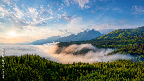 A misty morning in the beautiful Wildschönau region of Austria. It lies in a remote alpine valley at around 1,000m altitude on the western slopes of the Kitzbühel Alps. photo