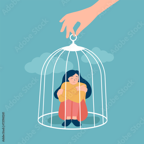 the hand of a psychologist opens a cage in which a sad girl sits. Psychological help concept. Treatment of depression concept