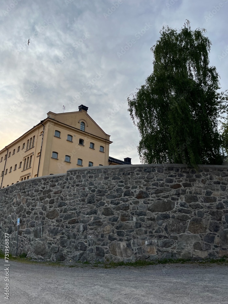 old prison with prison stone wall