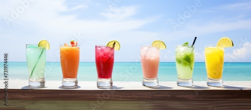 Tropical fresh drinks on sea background.