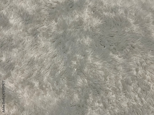 Gray fluffy carpet texture background