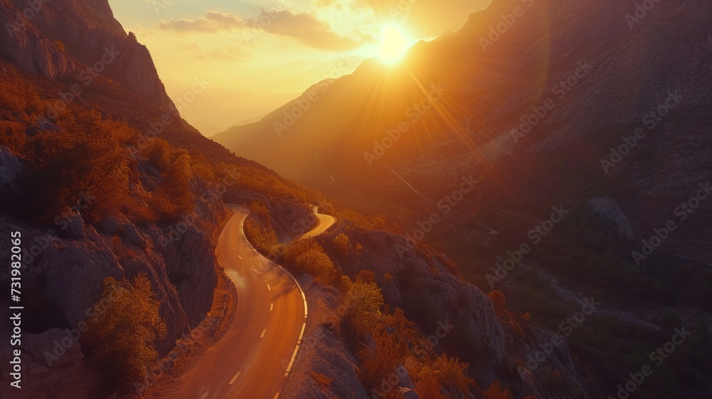Aerial view of a beautiful mountain road, at sunrise