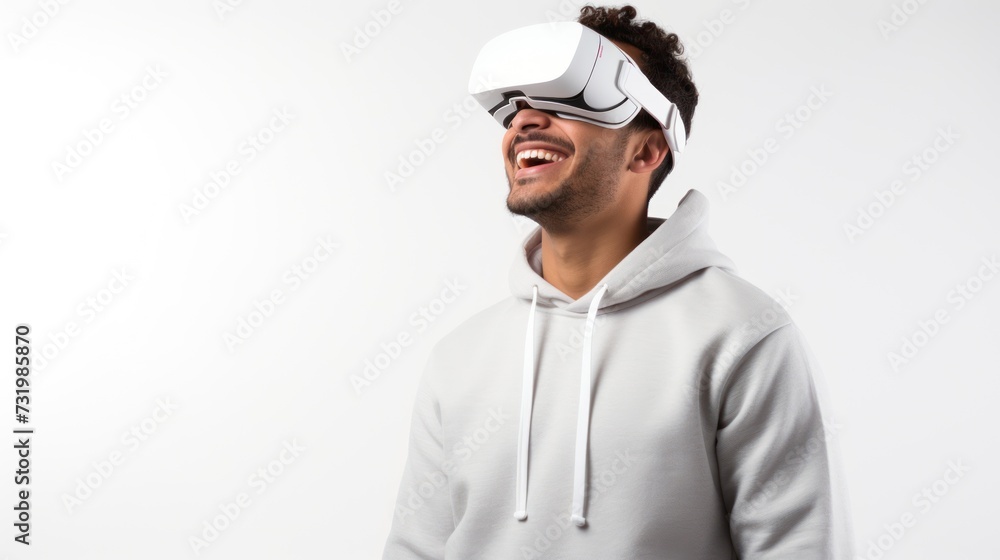 A young man using VR glasses, happy, Isolated on a white background studio portrait. VR, future, gadgets, technology, A young man using VR glasses, happy, Isolated on a white background studio portrait. VR, future, gadgets, technology,