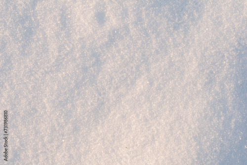Snow surface close-up in sunny weather.