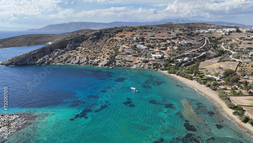 Fototapeta Naklejka Na Ścianę i Meble -  Aerial drone photo of paradise beach of Tsigouri and heart shaped small islet of Plaka, Schoinousa, Small Cyclades, Greece
