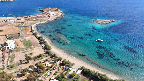 Aerial drone photo of paradise beach of Tsigouri and heart shaped small islet of Plaka, Schoinousa, Small Cyclades, Greece © aerial-drone