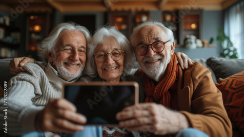 Family selfie. A moment of togetherness captured on a phone, an elderly group in a harmonious setting, their interaction with technology epitomising a comfortable and connected retirement life