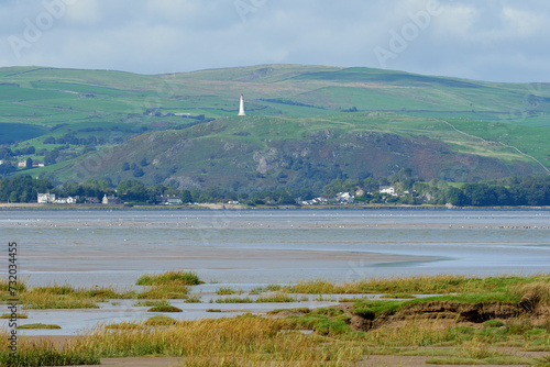 Hoad Hill and Canal Foot in Ulverston viewed across Morecambe Bay from Sandgate near Flookburgh.