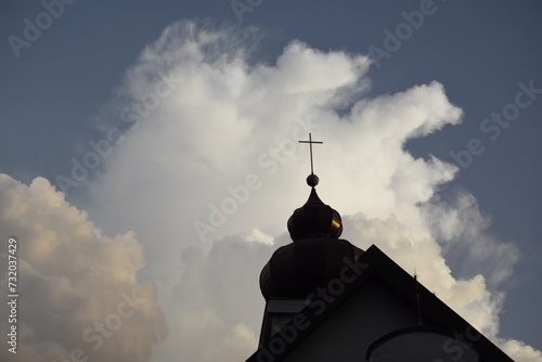 krzyż w chmurach  photo