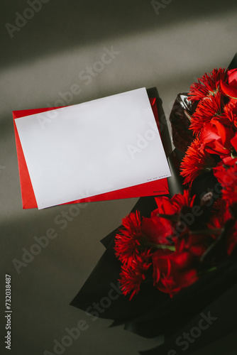 Postcard, letter with white space for text with bright red flowers for St Valentine's day