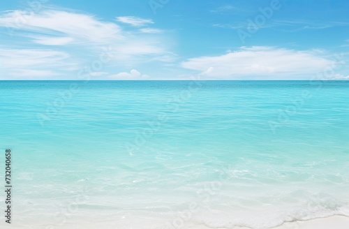 a beach with blue water © Alexei