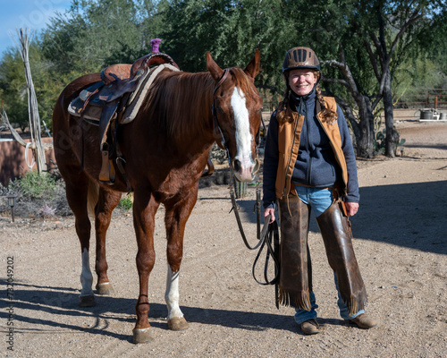 An elderly woman and her quarter horse in Arizona