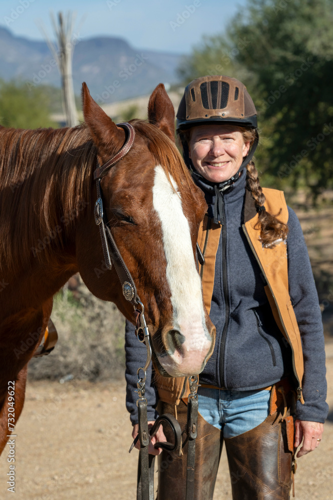 An elderly woman and her quarter horse in Arizona An elderly woman and her quarter horse in Arizona