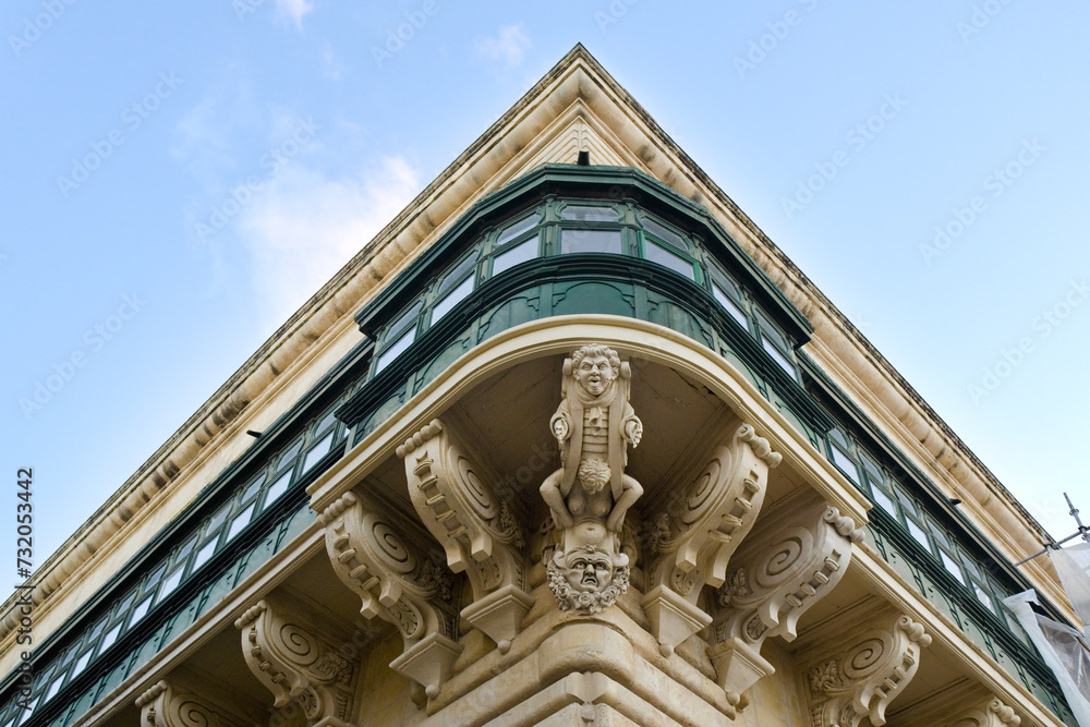 Detail of Grandmaster's Palace decorated with carved stone in Valletta, Malta	
