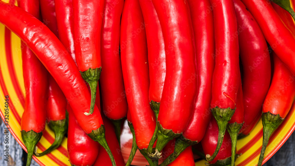 Red hot chilli peppers, close up. Background of red chilies