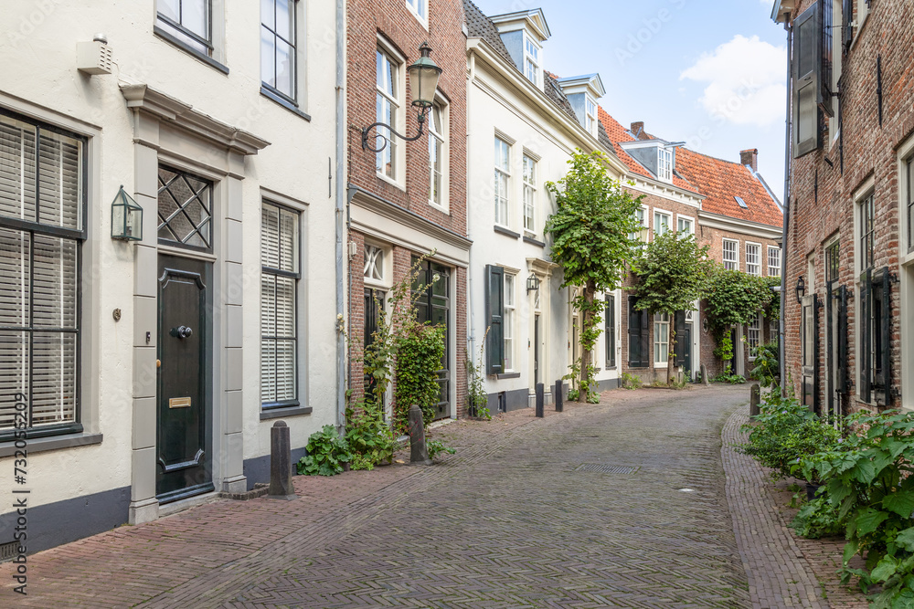 Narrow old street with wall houses in the old part of Amersfoort.