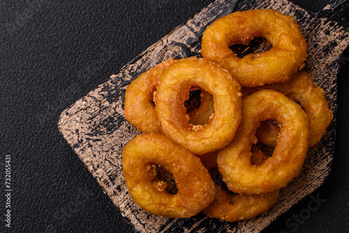 Delicious nutritious squid or onion rings deep fried with salt and spices