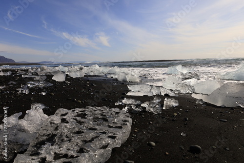 View on a iceberg on the Diamond Beach located south of the Vatnajökull glacier between the Vatnajökull National Park and the town of Höfn © marieagns