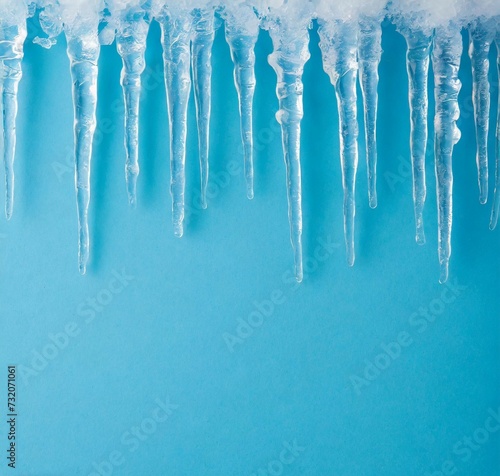 Icicles on light blue background