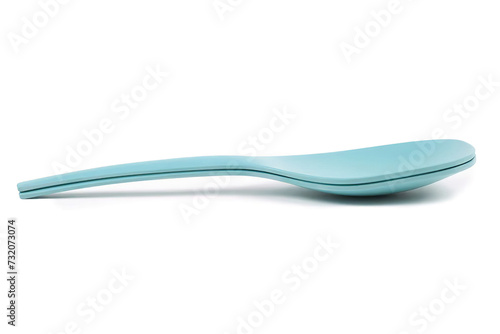 two blue plastic spoons isolated on white