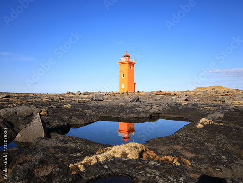 The Stafnes lighthouse is located at the western end of the Reykjanesskagi, near Keflavík, in the Suĭurnes region photo