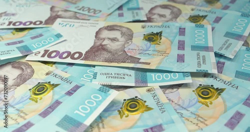 Ukrainian banknotes. Money of Ukraine. New banknotes 1000 Hryvnia in uncirculated condition, UNC. Real Ukrainian paper money of blue yellow color, UAH. Cinema 4K video