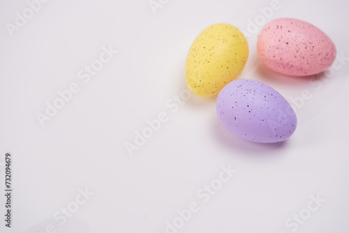 colorful Easter eggs on white background, Easter tradition, background with Easter theme,