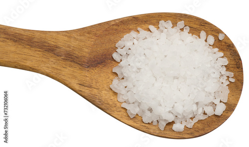 White salt crystals in a wooden spoon on an isolated background
