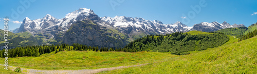 The panorama of Hineres Lauterbrunnental valley with the peaks Eiger, Monch, Jungfrau, Gletscherhorn, Ebenfluh, Mittaghorn and Grosshorn.
