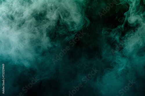 Abstract backdrop with a cloud of green and blue smoke on a black isolated background Creating a soft Mysterious And spooky design concept for horror or fantasy-themed projects