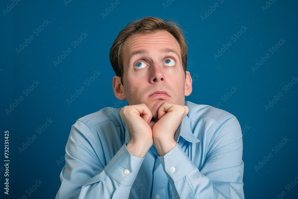 Surprised confused man with space for copy Surprised confused man with space for copy