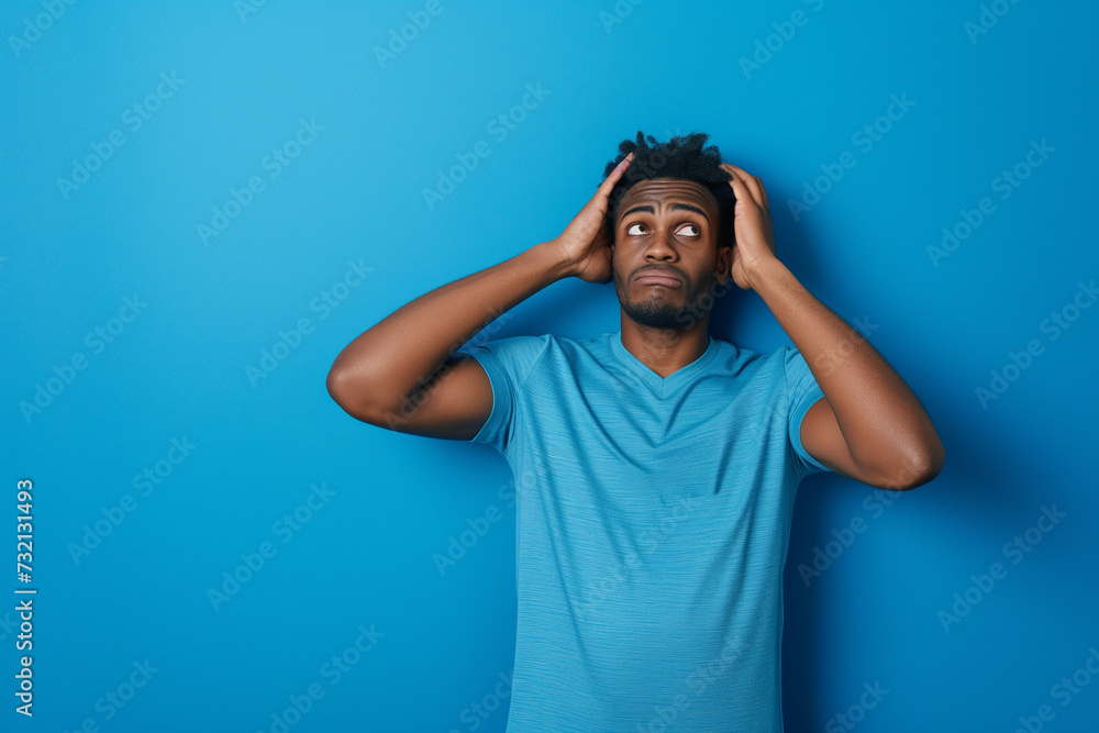 Surprised confused man with space for copy Surprised confused man with space for copy
