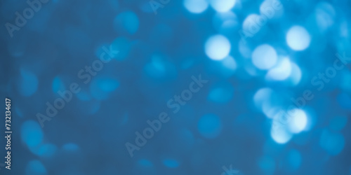 Sparkles defocus light. Glitter paper defocus as background. Blue.