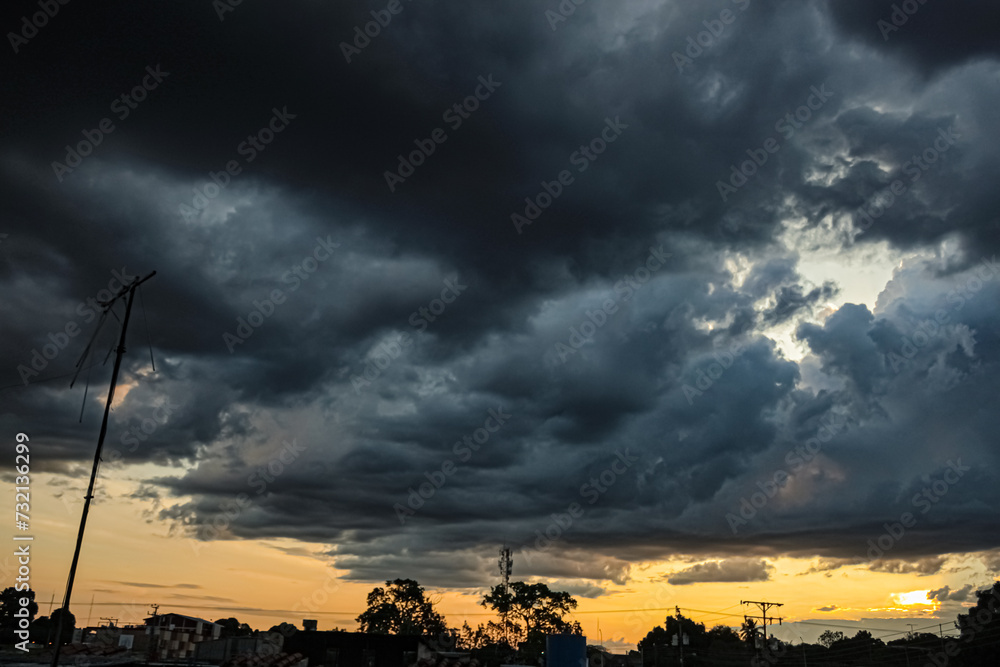 Dramatic sky with stormy clouds at sunset. Nature background Dramatic sky with stormy clouds at sunset. Nature background